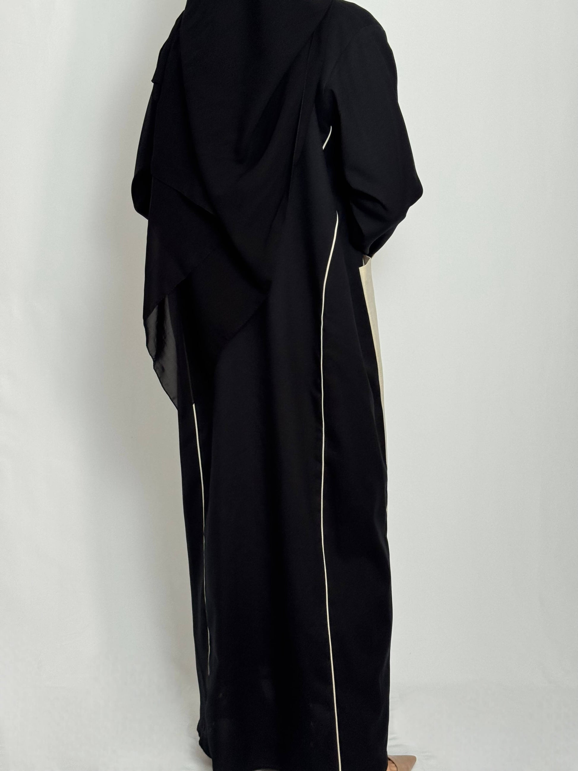 Elegante abaya noir et beige Lina Palm vue de dos